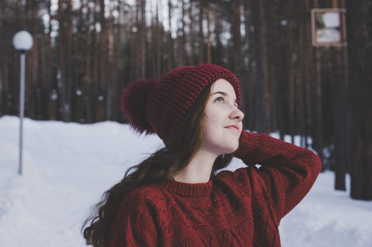 woman-wearing-maroon-bobble-beanie-on-winter-day-905011-scaled